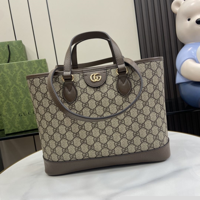 G*u*i shopping bags